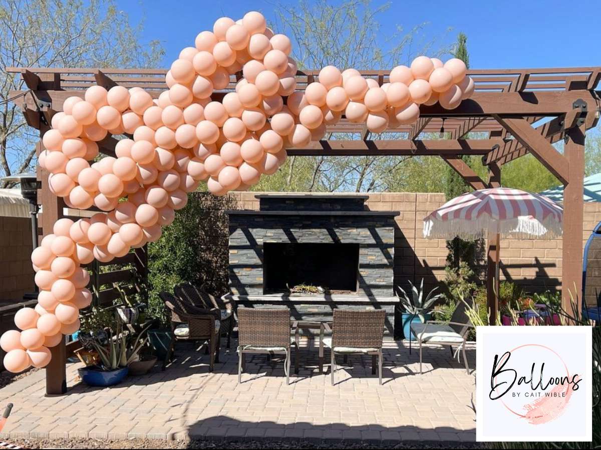 Weather-Resistant Balloon Decor for outdoor patio setup by Balloons by Cait Wible